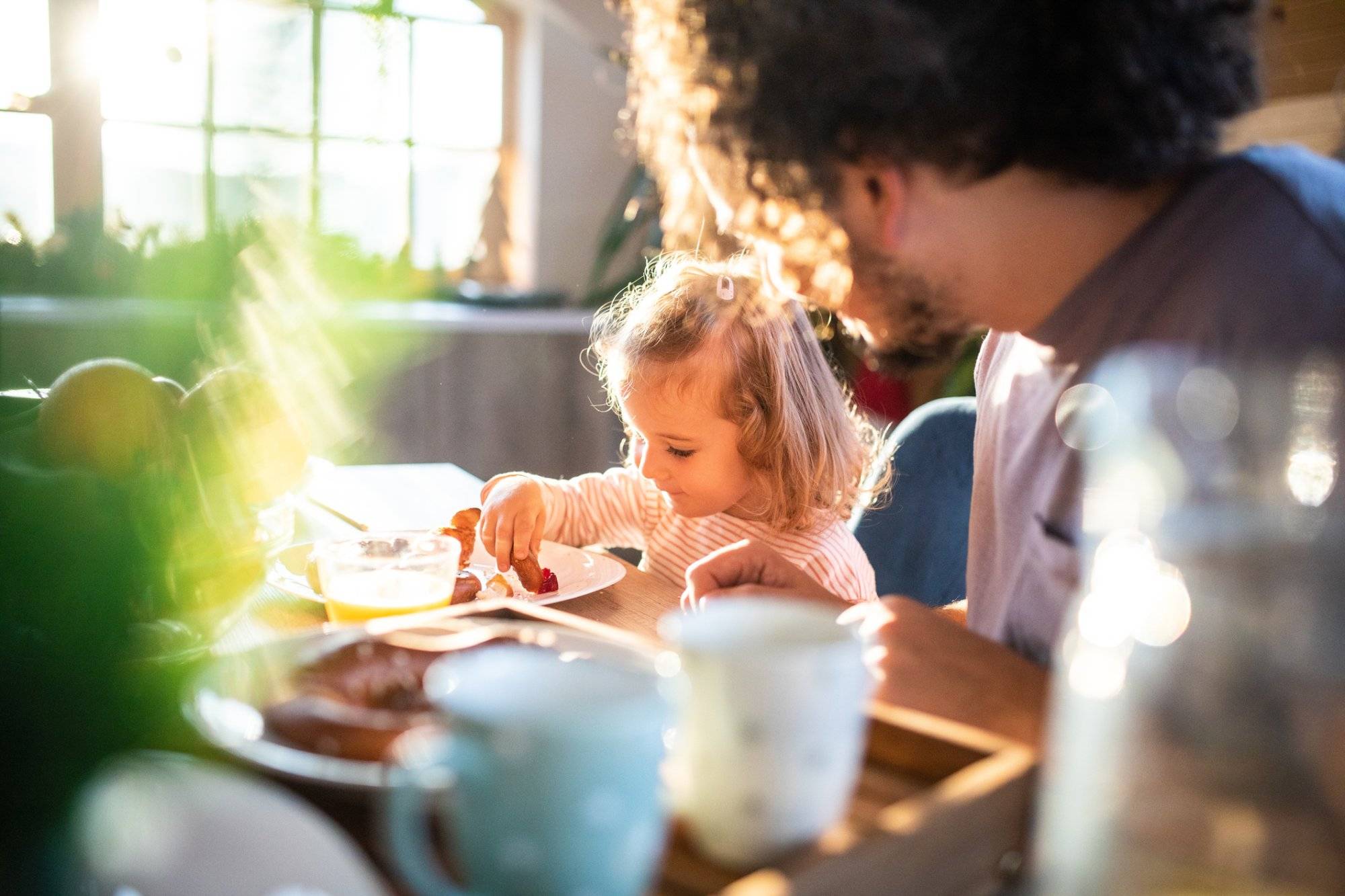 Enjoying a wholesome breakfast with dad Enjoying a wholesome breakfast with dad