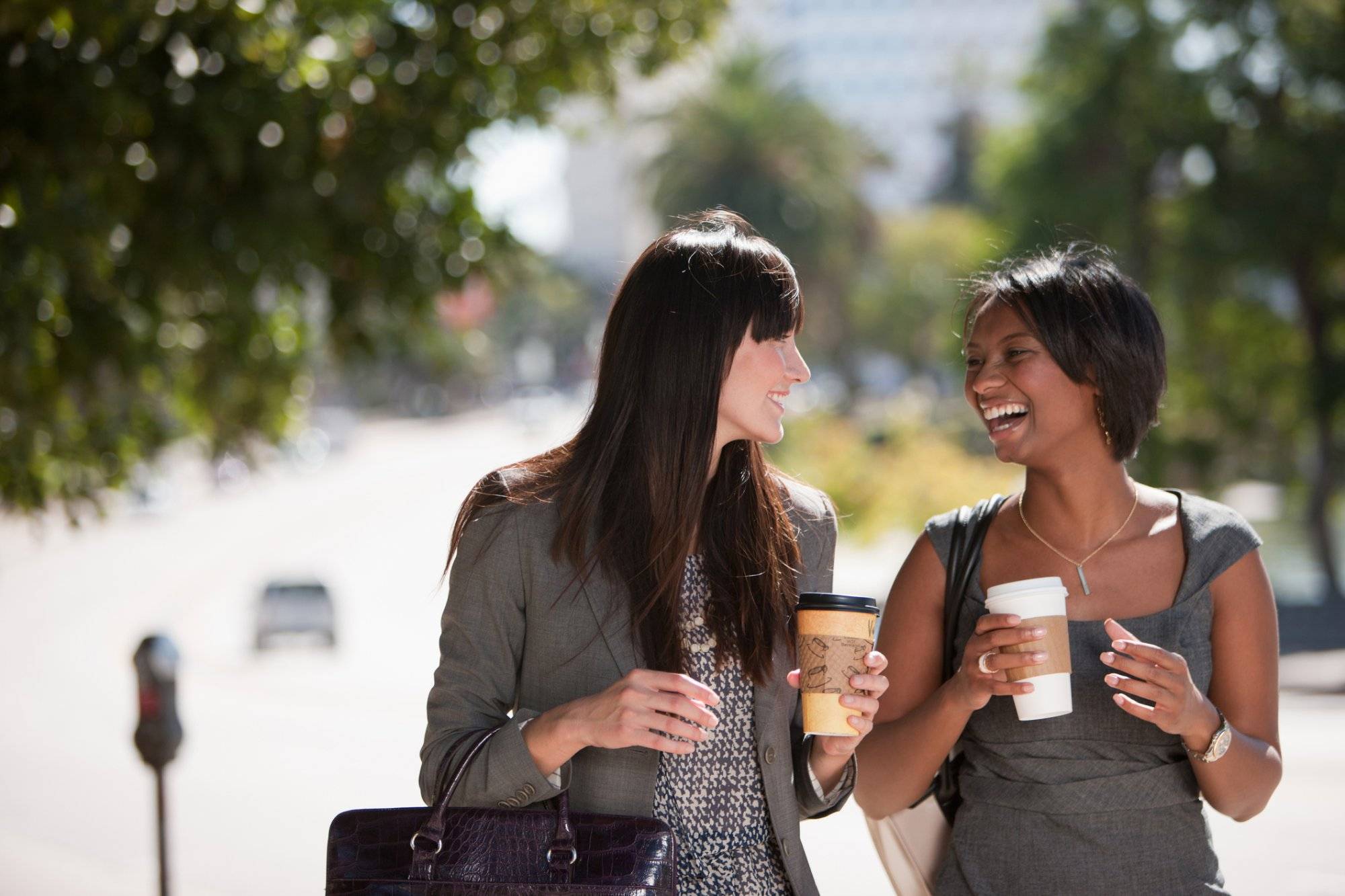 Businesswomen walking together outdoors