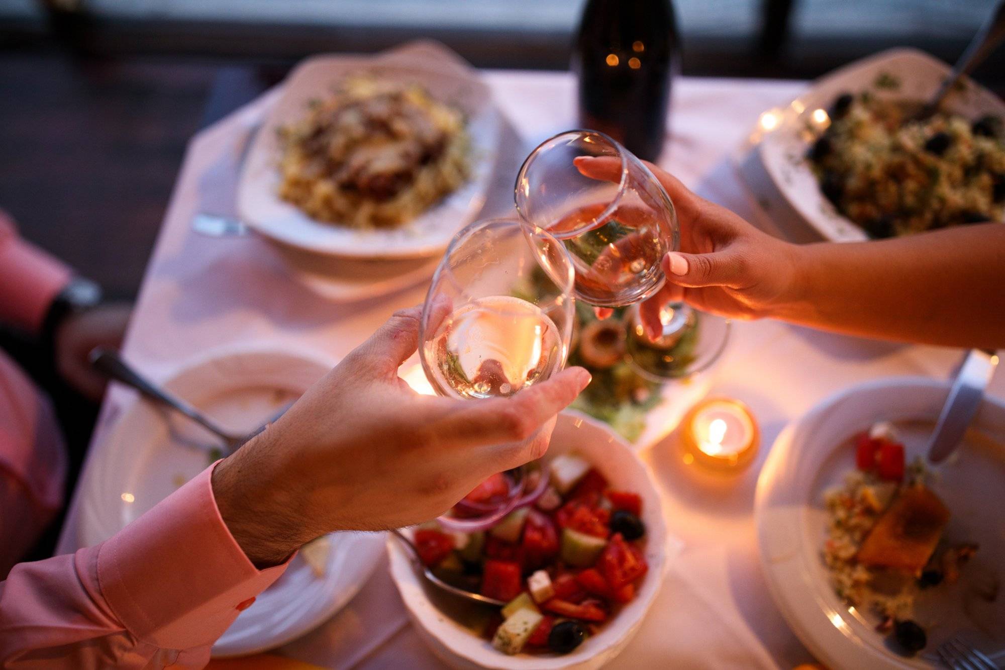 Young couple enjoying romantic dinner Young couple enjoying romantic dinner